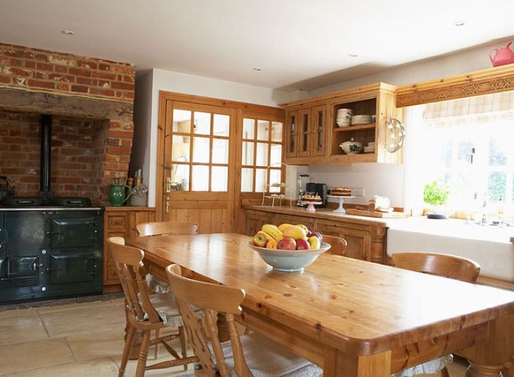 Stylish dining table and chairs crafted from rubberwood, showcasing a rich finish and sturdy design, perfect for family meals and gatherings.