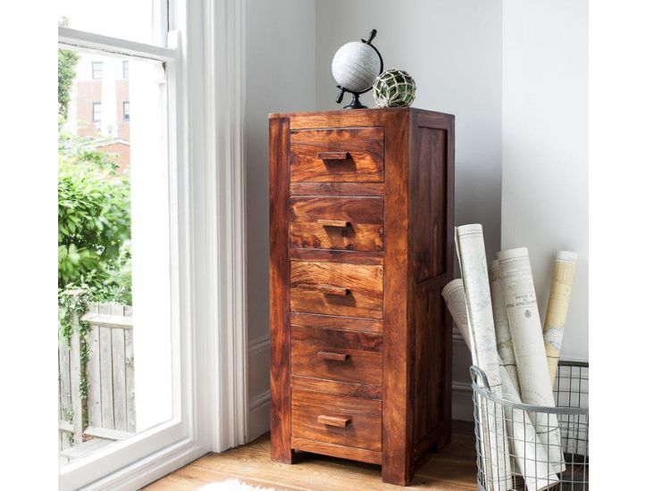 Stylish Sheesham wood cabinet placed in the corner of a room beside a window, combining functionality with elegance and maximizing natural light.