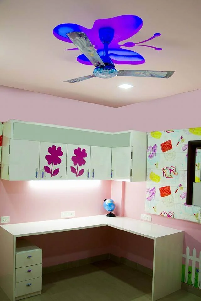 Daughters-room-pink-colour-theme-with-study-table-design