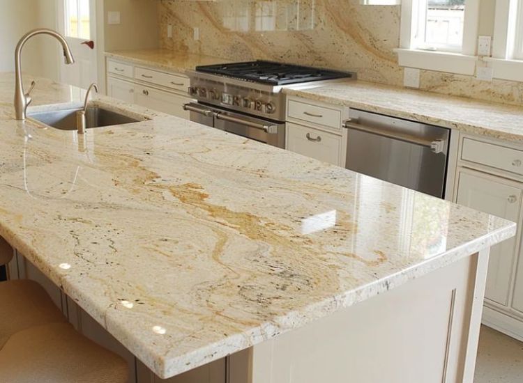 Yellowish granite kitchen countertop with a polished finish, enhancing the warm, inviting atmosphere of the space.