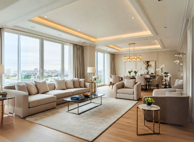 Penthouse design with smart zoning of open-plan living areas, using furniture placement, rugs, and partitions to create distinct spaces for dining, lounging, and entertainment.