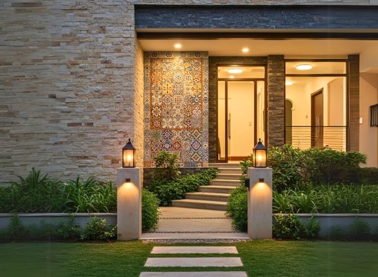 Colorful tiled mural at the exterior enhances house entrance design, creating a unique and artistic focal point for the entryway.