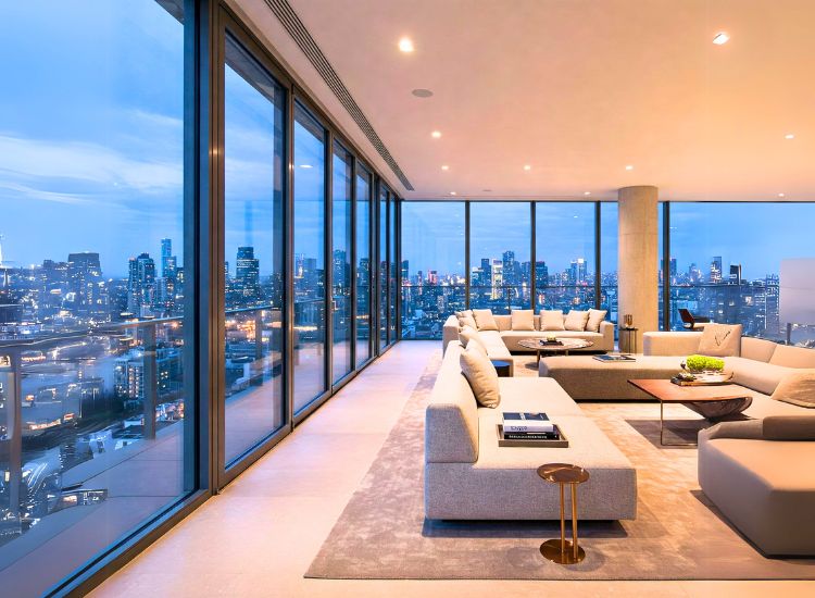Luxurious modern penthouse with panoramic city views, open-plan interiors, and elegant decor showcasing what makes a penthouse special.