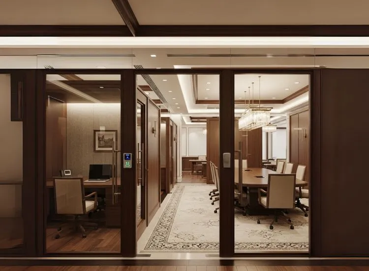 A traditional corporate office setup with private cabins and partitioned workspaces, reflecting corporate office interior design and effective office interior design ideas for privacy.