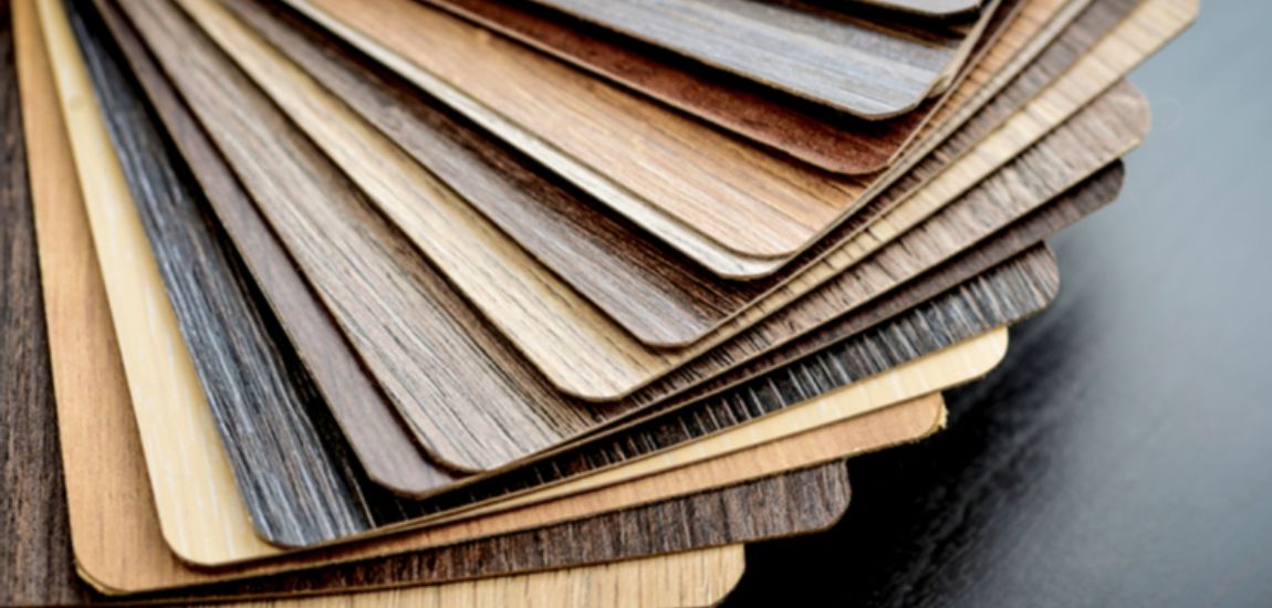 A stack of various wood samples used for furniture laminate. It’s highly durable, easy to maintain, and very pocket-friendly