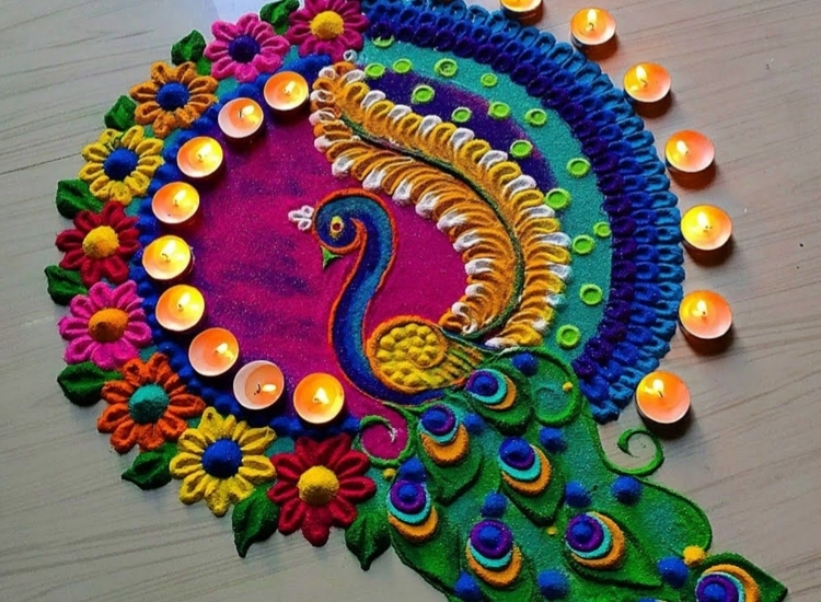 Intricate peacock rangoli created with bright colors, symbolizing beauty and prosperity during Diwali.
