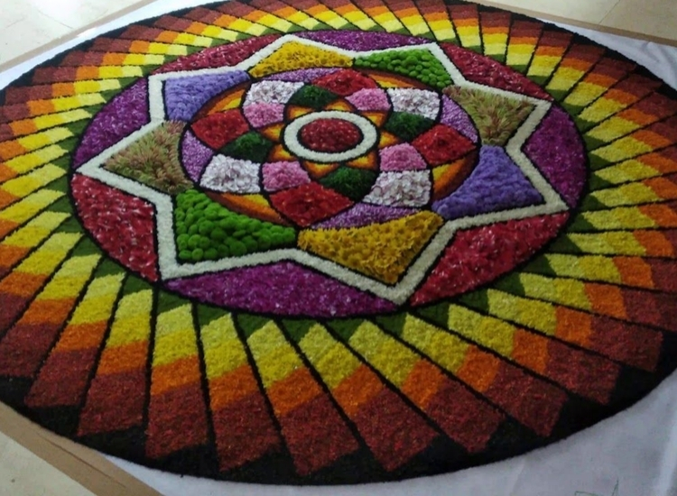 Colorful geometric rangoli design featuring intricate patterns and vibrant hues, perfect for festive decorations