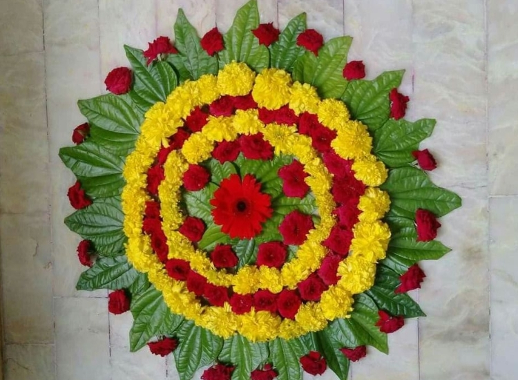 Beautifully designed eco-friendly rangoli using biodegradable ingredients, creating a vibrant and green festive atmosphere.