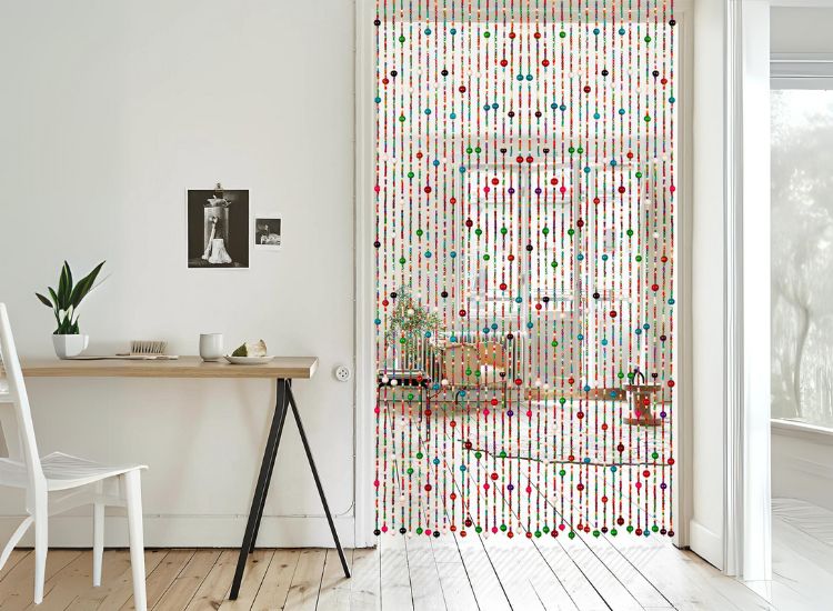Elegant beaded curtains in vibrant colors draped across a doorway, enhancing the aesthetic appeal of the surrounding space.