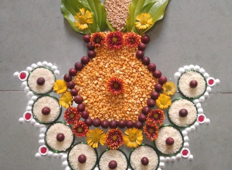 Colorful grain and pulse rangoli featuring intricate designs made from various grains, perfect for festive celebrations.