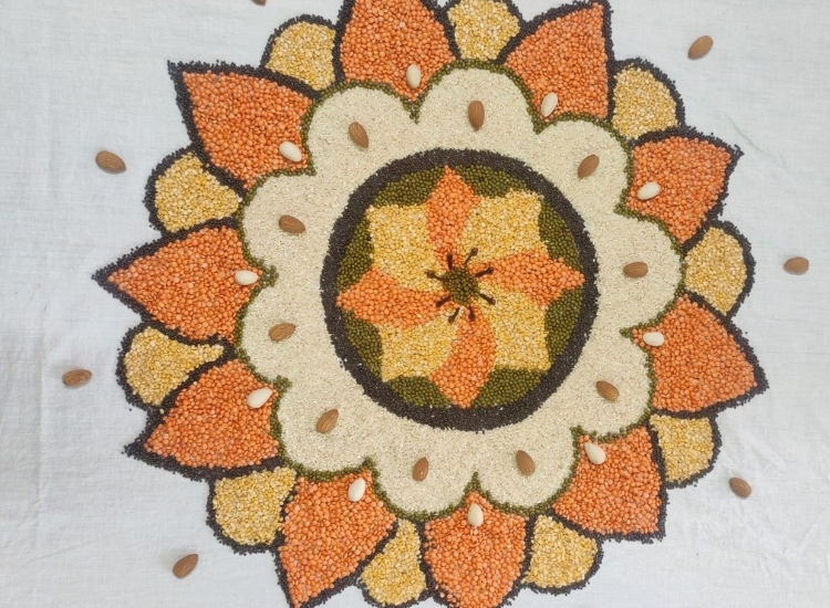 Eye-catching grain and pulse rangoli design showcasing beautiful patterns crafted from an array of colorful grains and pulses.