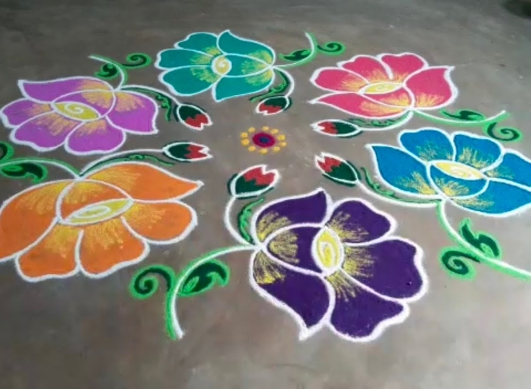 Dot rangoli featuring vibrant colors and elaborate patterns made from carefully placed dots, enhancing festive celebrations beautifully.