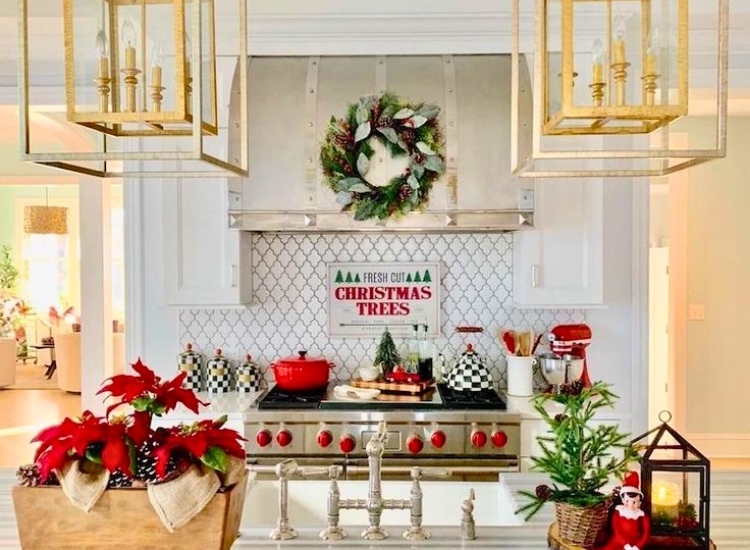 "Kitchen island decorated with poinsettias adds a festive touch. christmas tree drawing image complements the décor."