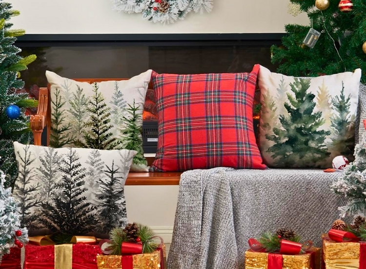 "Plaid throws and cushions create a warm, cozy holiday look. christmas tree drawing image in the corner."