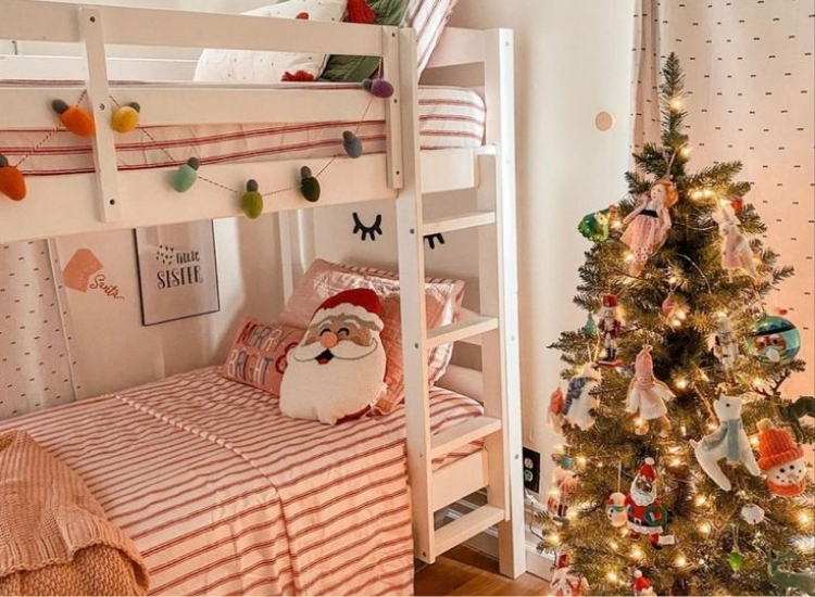 "Mini Christmas tree with kid-friendly ornaments adds festive fun. christmas tree picture enhances the holiday atmosphere."