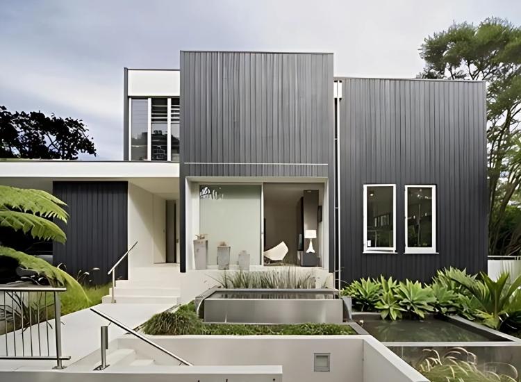 13. Black painted shadow cladding home