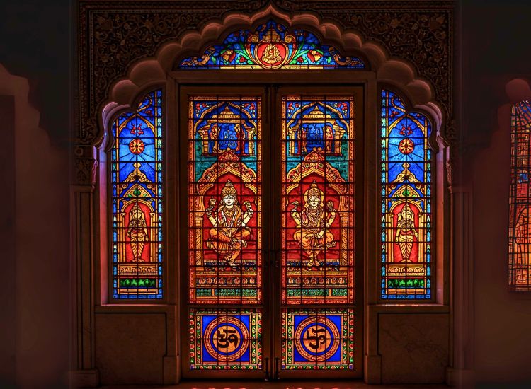 12. Pooja Room Door Design In Glass With Stained Patterns