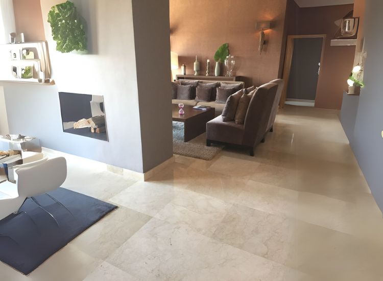 Crema marfil marble flooring bringing warmth in the living space.