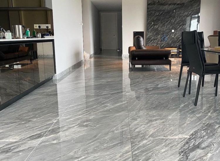 Bardiglio marble flooring featuring a supreme quality finish and giving classy vibe to the living room.