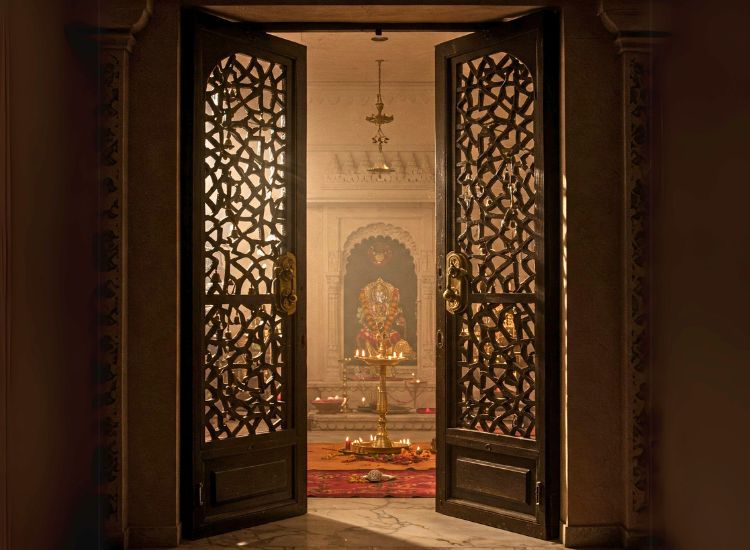 Jali Design With Bells Double Doors Design.