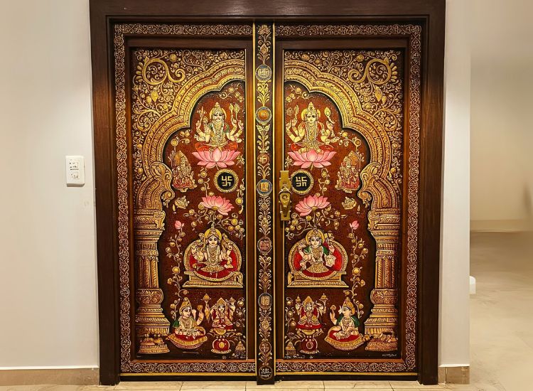 7. Artistic Pooja Room Door Design With Handpainting