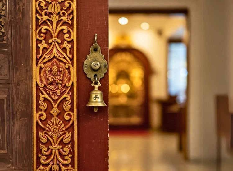 8. Pooja Room Door Bell Design For A Divine Touch