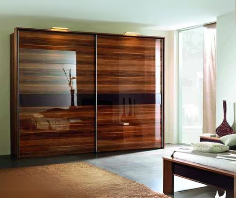 Lamination polish on veneer wardrobe resembling glass over wood veneer and giving luxurious look to the interior