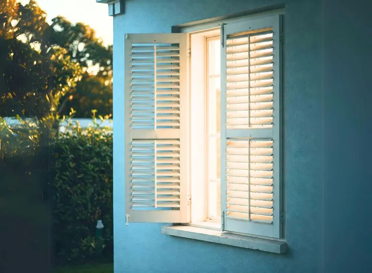 Modern home featuring louvered windows, offering a smart and stylish solution for ventilation and sleek design.