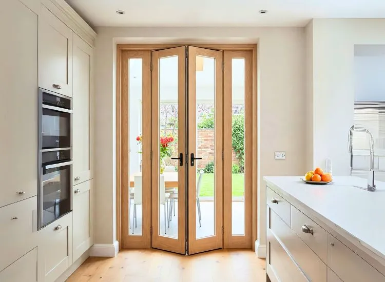 Stylish bifold door design in wood, offering a space-saving solution and modern aesthetic for house interiors and door types.