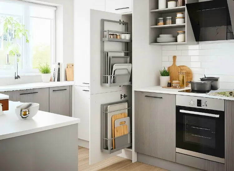 Vertical trays in modular kitchen cabinets offer neat, space-saving designs for kitchen cupboards and storage.