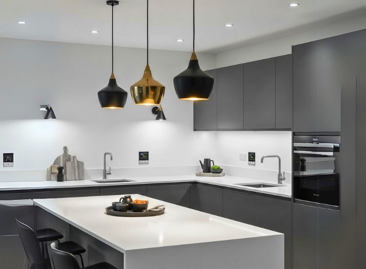 Contemporary lighting in kitchen featuring pendant lights and layered illumination that enhance modern kitchen lighting design aesthetics.