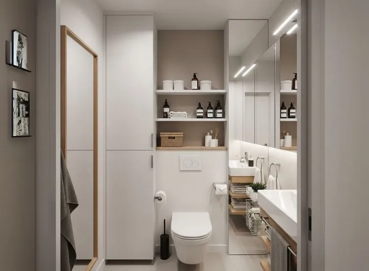 Clever small bathroom ideas using vertical storage and wall-mounted cabinets to enhance functionality in compact spaces.