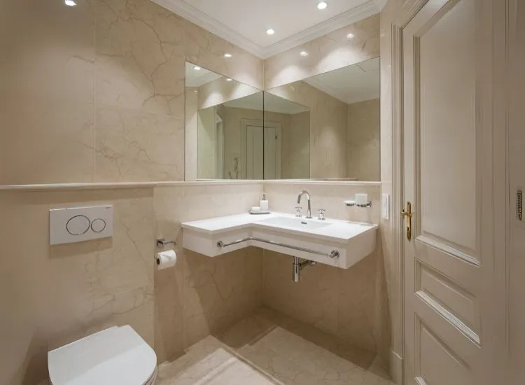 Elegant small bathroom ideas showcasing luxe marble finishes paired with compact layouts for a refined, space-saving design.